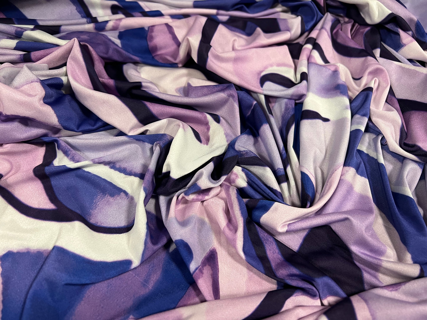 Soft touch stretch spandex single jersey fabric, per metre - swirl print - lilac & blue