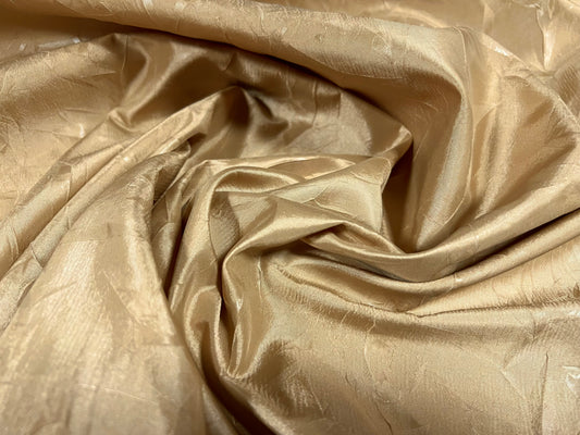 Taffeta woven dress fabric - pressed leaf design - gold