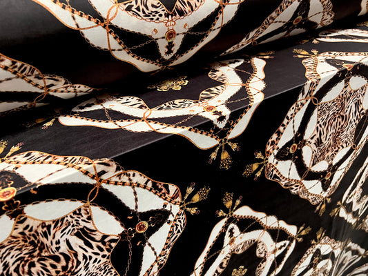 Soft touch stretch spandex jersey fabric, per metre - designer Leopardskin & chains print - black & gold