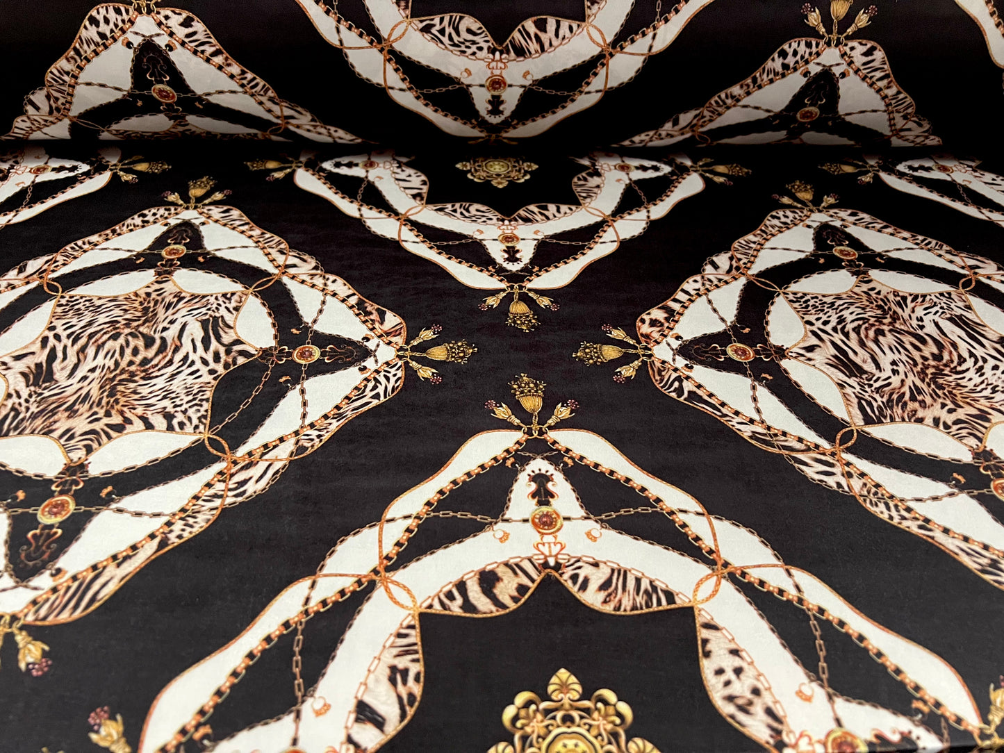 Soft touch stretch spandex jersey fabric, per metre - designer Leopardskin & chains print - black & gold