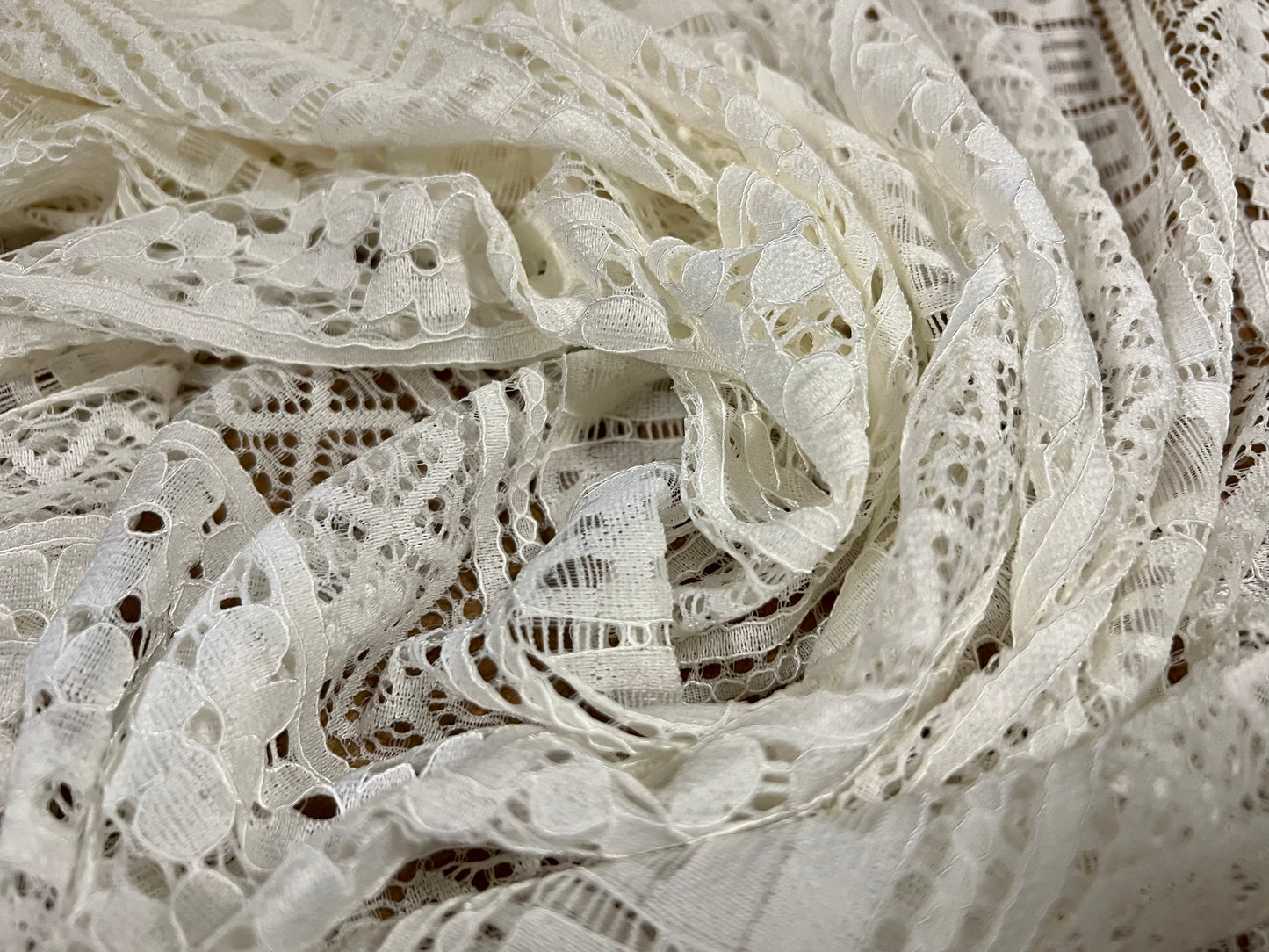 Corded stretch spandex lace fabric, per metre - floral geometric stripe - cream