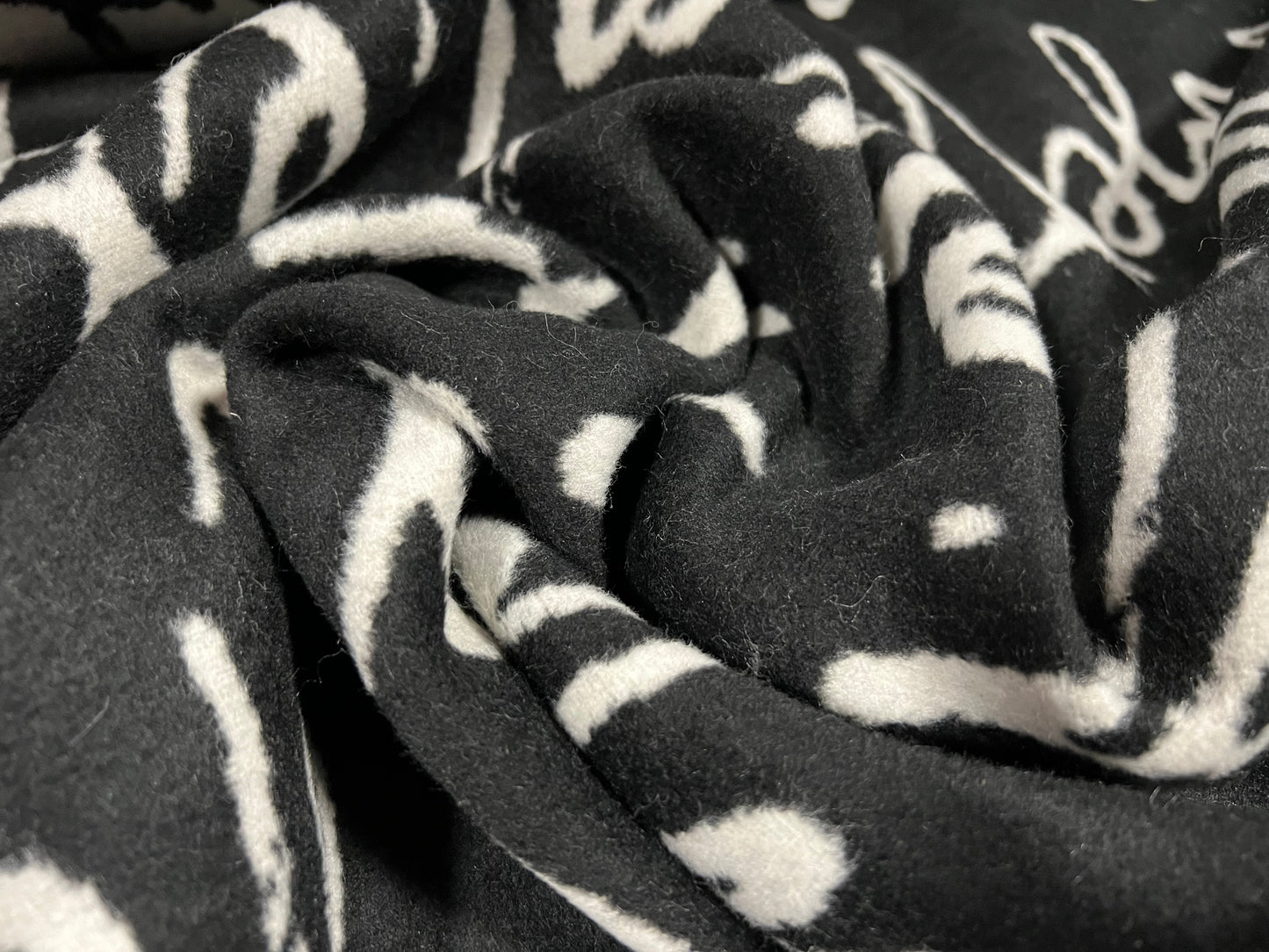 Wool mouflon flannel fabric, per metre - artistic diversity words jacquard - black & grey