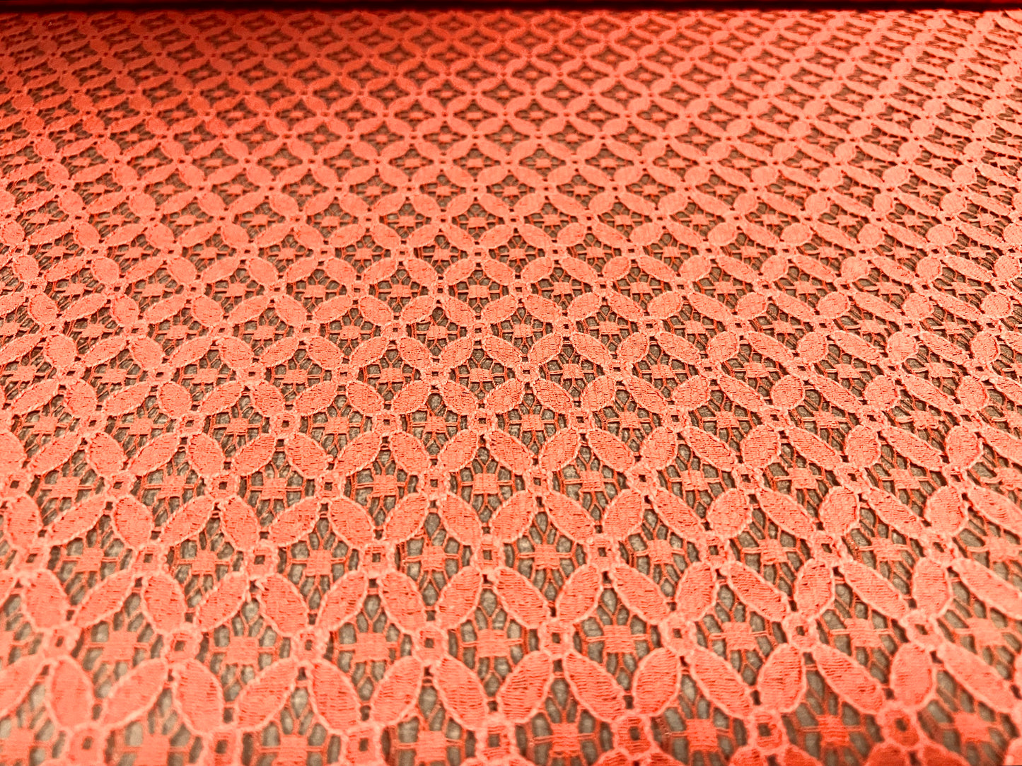 Lace dress fabric, per metre - quatrefoil floral design - coral