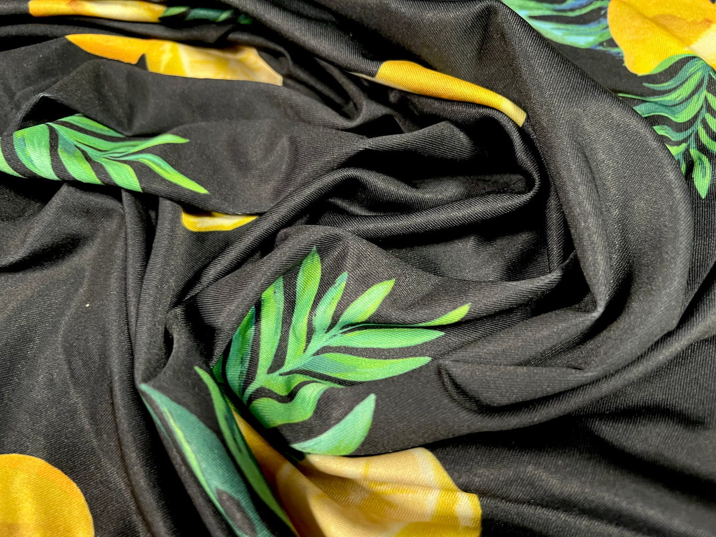 Stretch spandex single jersey fashion fabric, per metre - lemon fruit print - black and yellow