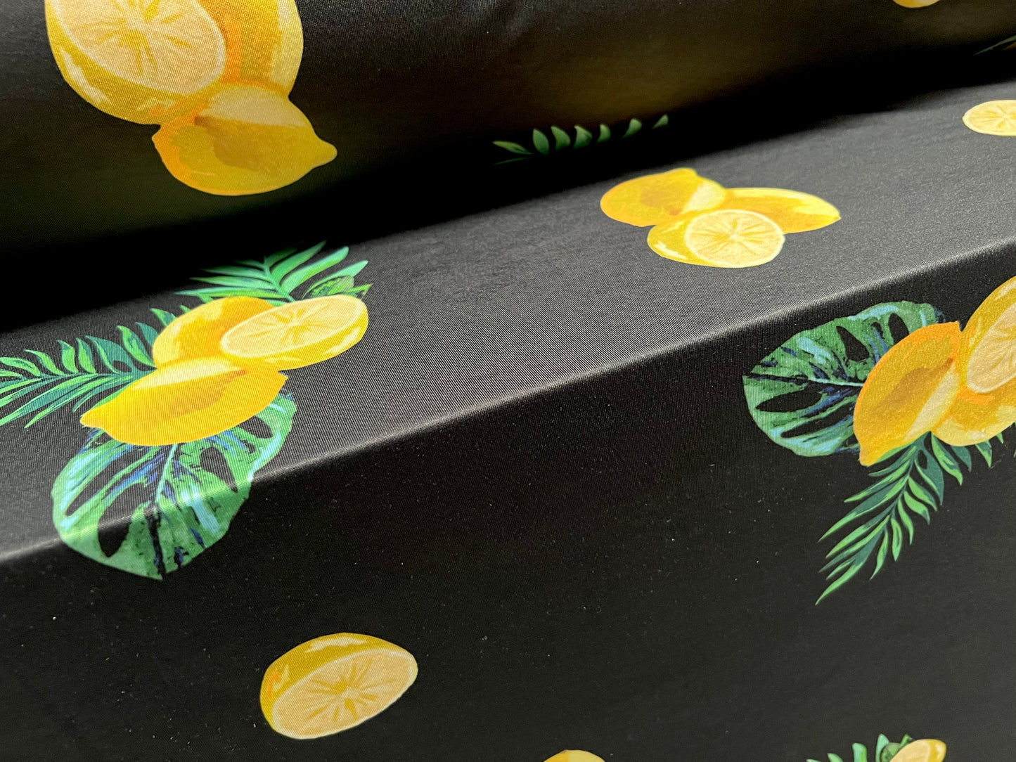 Stretch spandex single jersey fashion fabric, per metre - lemon fruit print - black and yellow