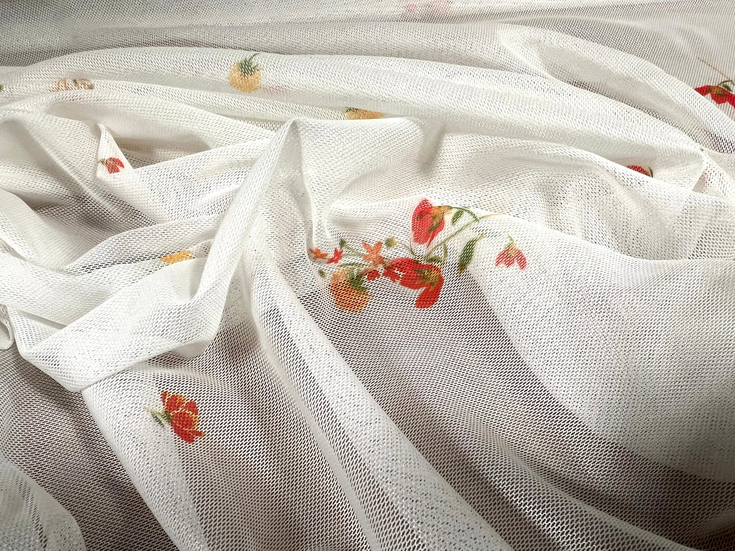 Power mesh net stretch spandex fabric, per metre - smalll flower print - white & orange