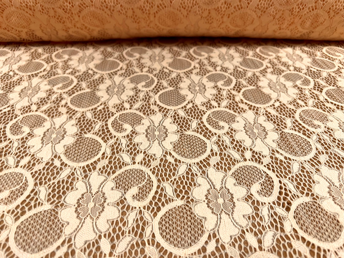 Stretch spandex lace dress fabric with scalloped selvedge, per metre - floral - corded - peach